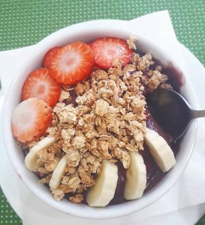 açai bowl topped with granola, banana and strawberrys #Veganuary at Vida Leve in Faro
