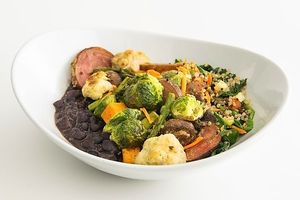 Seasonal Roasted Vegetable Bowl Beets, mushrooms, asparagus, red onion, brussels sprouts, cauliflower, yams, walnut-cilantro pesto organic baby spinach, quinoa, veggies, beans at Sharky's Woodfired Mexican Grill  in Oxnard