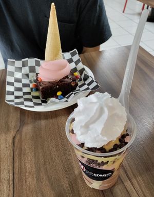 Brownie with ice-cream, and own experiment (cherry+Ferrero roche ice-cream, peanutbutter sauce and chocolate toppings) at NiceCream in Santiago