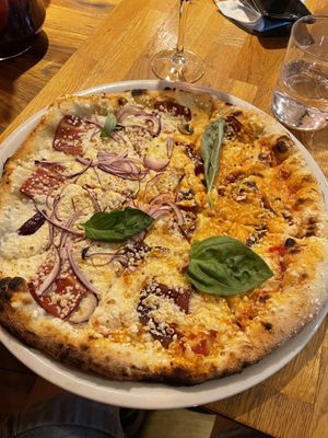 (Left) carbonara / Luna 4 vegan cheese (right)   at Manso Pizzeria in Barcelona