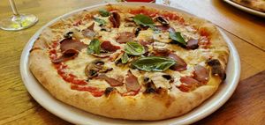 Vegan smoked ham pizza, with basil and mushrooms. at Manso Pizzeria in Barcelona