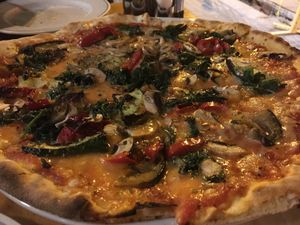 Vegetable pizza with vegan cheese  at Manso Pizzeria in Barcelona