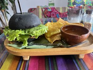 Burger is all bread, little tempeh. Insufficient salsa for the chips. Left hungrier than when I entered.  at Wachuma in Antigua
