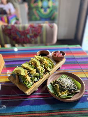 Tempeh & Teriyaki Tacos and Kraut cracker w/ guacamole, mushrooms, pesto & sesame seeds.  at Wachuma in Antigua