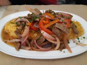 Main / Tacu tacu con lomito al jugo at Los Andenes Vegan in Madrid