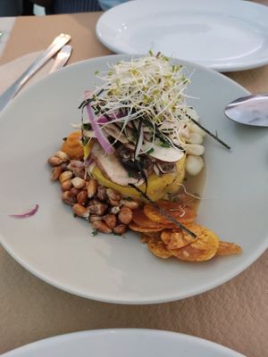 Causa acevichada with choclo, canchita, chifle and all! at Los Andenes Vegan in Madrid
