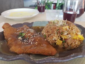 Fried rice and "chicken" at Los Andenes Vegan in Madrid