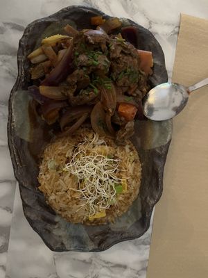 Arroz chaifa y lomo saltado  at Los Andenes Vegan in Madrid