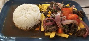 Lomo Saltado at Los Andenes Vegan in Madrid