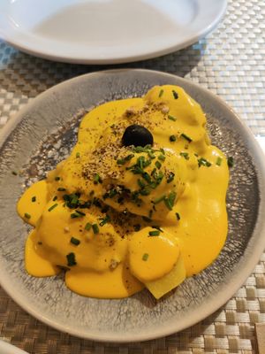 Papa a la huancaína at Los Andenes Vegan in Madrid