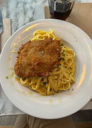 tallarines con huancaina y milanesa at Los Andenes Vegan in Madrid