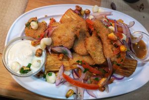 Fish flavored Peruvian dish  at Los Andenes Vegan in Madrid