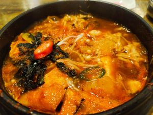 It's time to make poached rice 😂 at Daehwa Vegetarian in Central Singapore