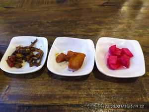 Complimentary sides (fried mushroom/sweet potato/pickled raddish) at Daehwa Vegetarian in Central Singapore