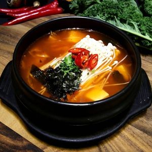 Kimchi Stew: silky tofu, hearty mushrooms, and an added kick from fermented kimchi at Daehwa Vegetarian in Central Singapore