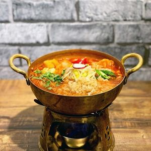 Jjamppong: a mix of noodles, vegetables, and mushrooms in a spicy, savory red soup base at Daehwa Vegetarian in Central Singapore