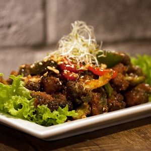 Yangnyeom Broccoli: lightly battered broccoli, tossed in a special sweet spicy red sauce at Daehwa Vegetarian in Central Singapore