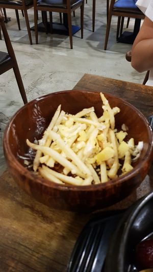 Huge bowl of truffle fries. Photo is showing already 2/3 finished. at Daehwa Vegetarian in Central Singapore