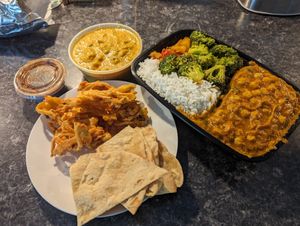 VEGAN naan, channa masala, garlic broccoli, onion pakora, probably aloo capsicum!!! at Bombay Royale in Northampton