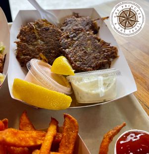BAY CAKES (in a boat or on a bun)
Old Bay artichoke patties, on romaine lettuce, with tartar & radish sauces.  at Beaut Burger in Tucson