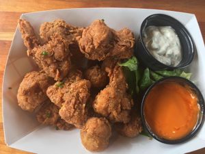 Beer battered cauliflower bites with buffalo sauce and ranch dressing. Yum! at Beaut Burger in Tucson