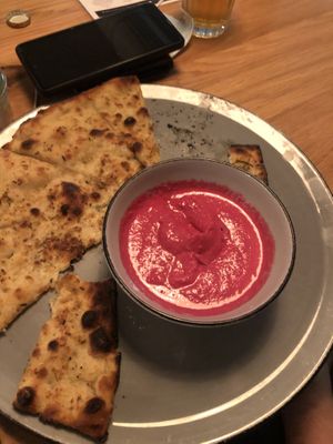 red hummus (a bit watery) & garlic bread (very oily/ dripping & partly burnt) at Stripped Pizza - Talacker in Zurich