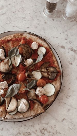 Veganzza pizza with cashew cheese at Stripped Pizza - Talacker in Zurich