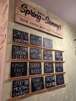 Menu wall at SOIL Vegan Cafe - West in Amsterdam