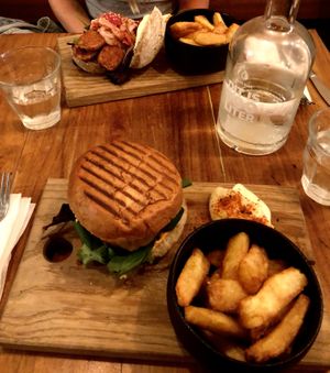 Cheesy Burger and Choripán   at SOIL Vegan Cafe - West in Amsterdam