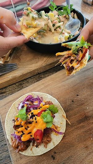 Mango ceviche and pulled jackfruit tacos at SOIL Vegan Cafe - West in Amsterdam