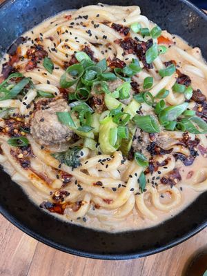 The noodles! Warm, spicy and the meatballs are delicious.  at SOIL Vegan Cafe - West in Amsterdam