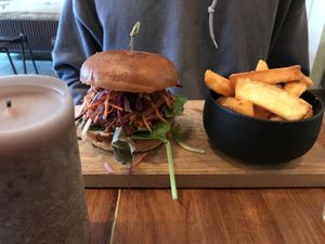 jackfruit burger with yuka fries  at SOIL Vegan Cafe - West in Amsterdam