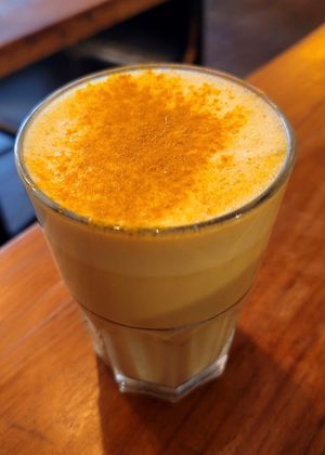 Golden turmeric latte at SOIL Vegan Cafe - West in Amsterdam