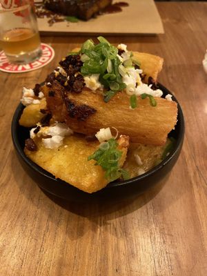 Yukas bravas: quite nice, with a tasty topping of feta and crispy chili. at SOIL Vegan Cafe - West in Amsterdam
