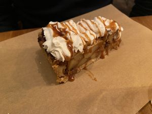 Apple pie: very nice. The whipped cream and caramel make it extra good. at SOIL Vegan Cafe - West in Amsterdam