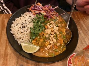 Peanut butter curry: very tasty, with healthy ingredients. The sauce was really good: a rich peanut flavour with something umami in it (miso?) at SOIL Vegan Cafe - West in Amsterdam