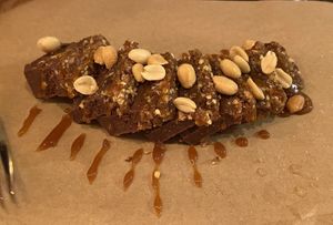 Snickers: tasty but quite heavy due to the fat (coconut oil?). The caramel sauce was very good. at SOIL Vegan Cafe - West in Amsterdam