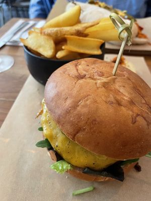 Cheezy burger and fries  at SOIL Vegan Cafe - West in Amsterdam