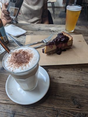 Pumpkin spiced latte, cheeze cake at SOIL Vegan Cafe - West in Amsterdam