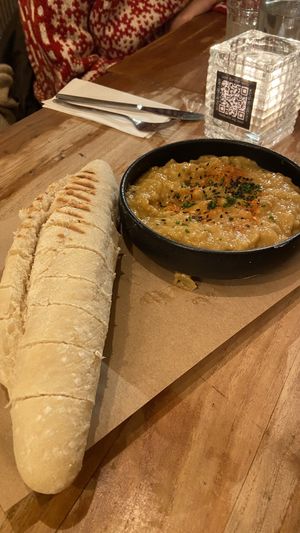 Aubergine dip with bread  at SOIL Vegan Cafe - West in Amsterdam