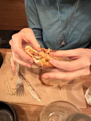 Remains of a chicken sandwich   at SOIL Vegan Cafe - West in Amsterdam