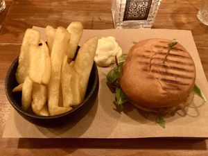 Chicken burger + fries  at SOIL Vegan Cafe - West in Amsterdam