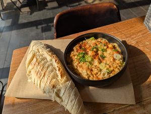 Smoky Eggplant Dip with Sourdough bread at SOIL Vegan Cafe - West in Amsterdam