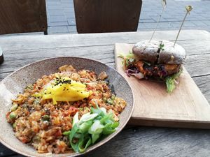 Kimchi fried rice and ninya burger at SOIL Vegan Cafe - West in Amsterdam