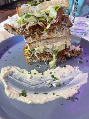 Chicken ceasar salad sandwich. Dry and overcooked and no ceasar dressing. Would have been better if salad and bacon tossed in dressing  at Mina Maria in Newtown