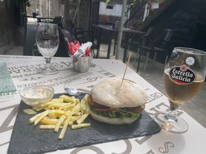 Falafel cheese burger after eating half the fries.  at Taberna do Farruco in A Coruna