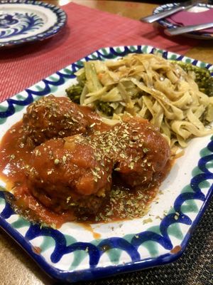 Stir-fried noodles and veg, with meatballs in a tomato-based sauce  at El Piano in Granada