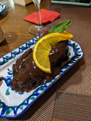Brownie with an orange chocolate sauce at El Piano in Granada