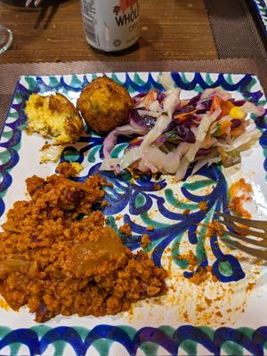 Half of the chili sin carne, coleslaw, and corn fritters at El Piano in Granada