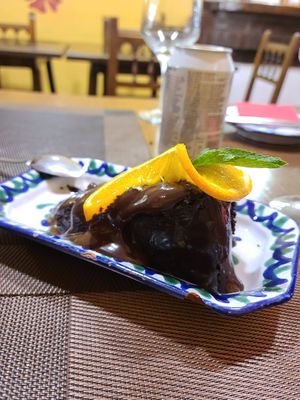 "Brownie" - chocolate cake with orange garnish at El Piano in Granada